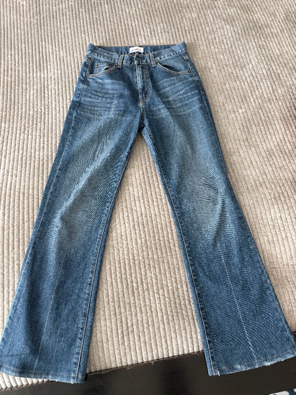 ASKK NY High Rise Boot Jean in the “Mammoth” wash.